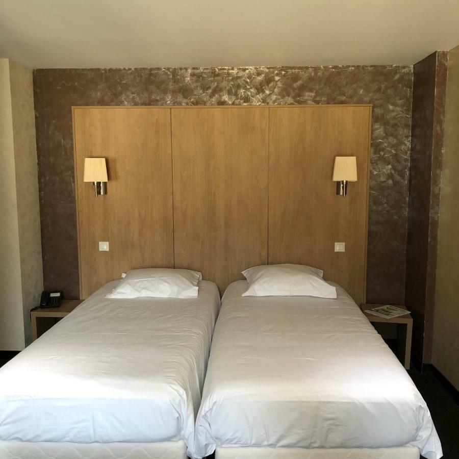 Logis L'Hotel D'Arc Arc-sur-Tille Bagian luar foto